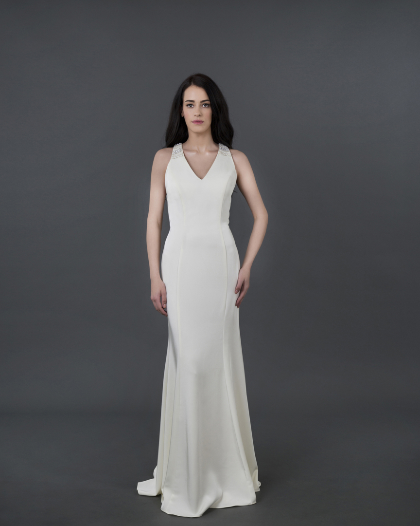 Marta dress, a minimalist crepe dress with a mermaid silhouette and extrema back neckline