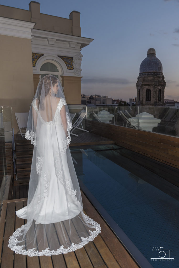 Bride wearing a mantilla wedding veil